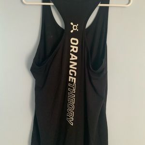 Woman’s orange theory fitness tank top